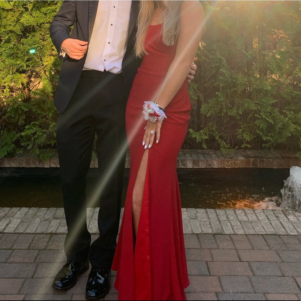I am selling a red sparkly dress!  I am 5’3 with for inch heels,weigh 120